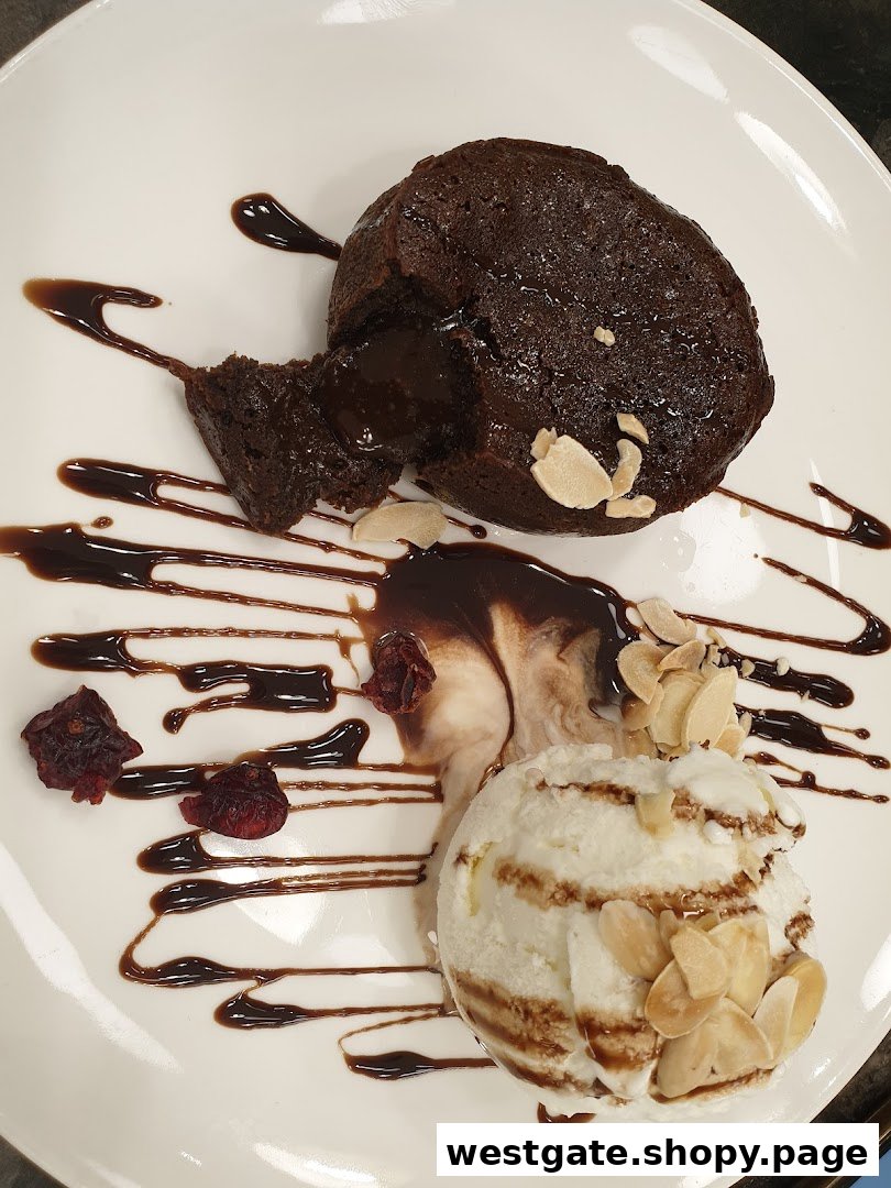 A decadent chocolate lava cake with molten center, served with vanilla ice cream and chocolate drizzle.