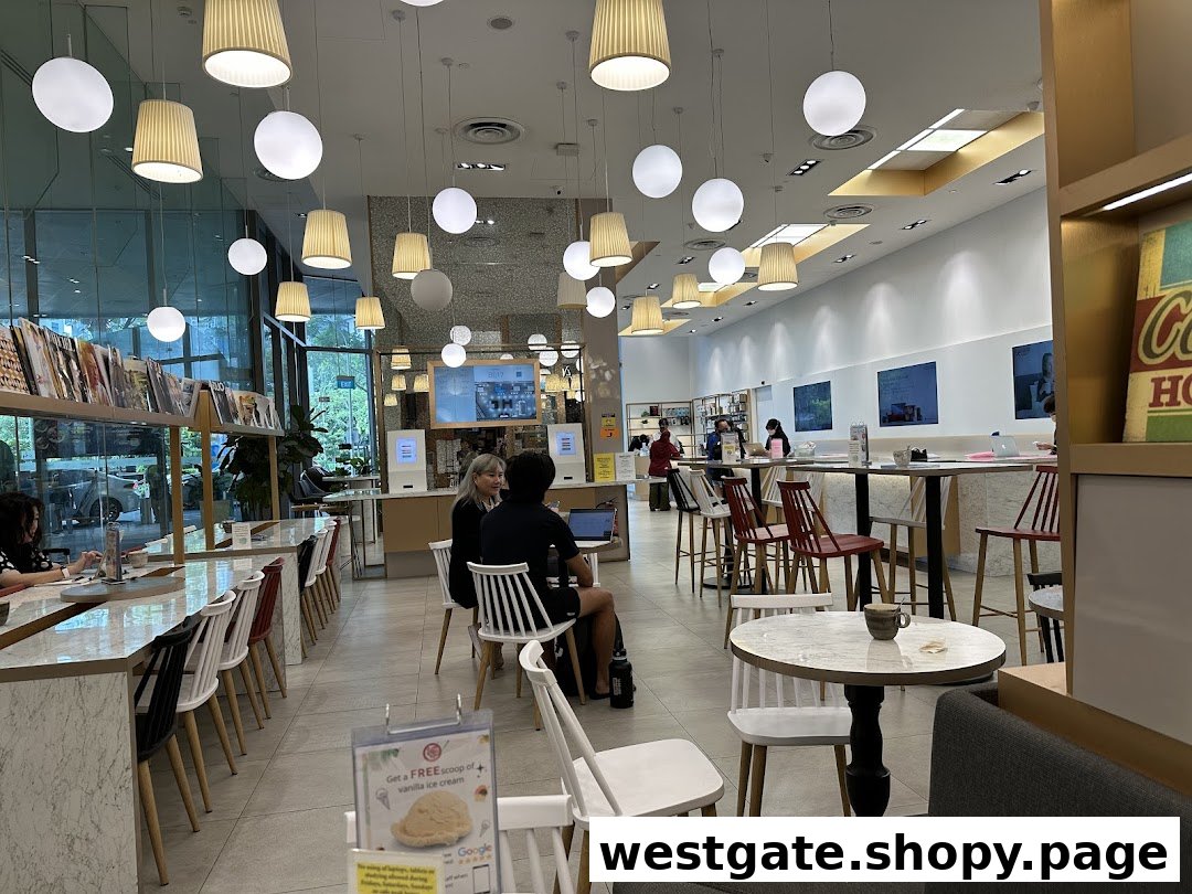 Bright, modern interior of an Apple Authorised Service Provider with customer seating and service areas.