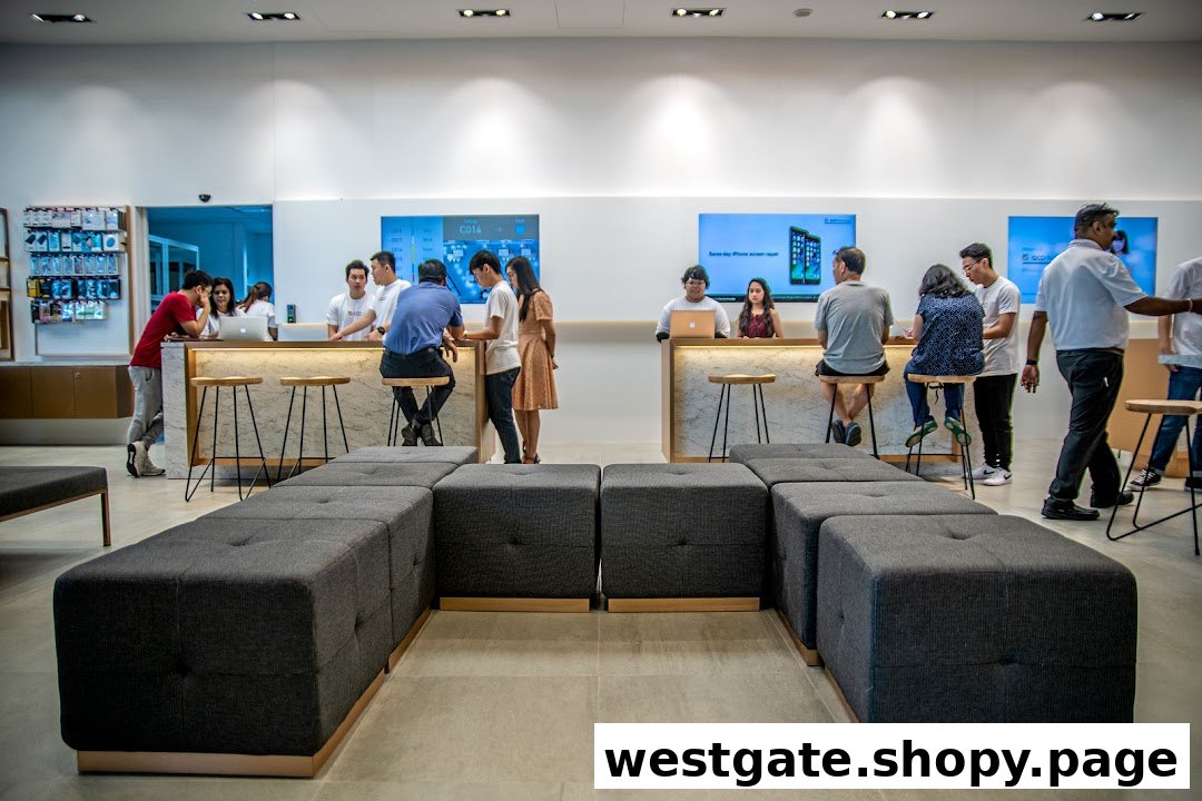 Customers and staff interact at service counters within an Apple Authorised Service Provider store.