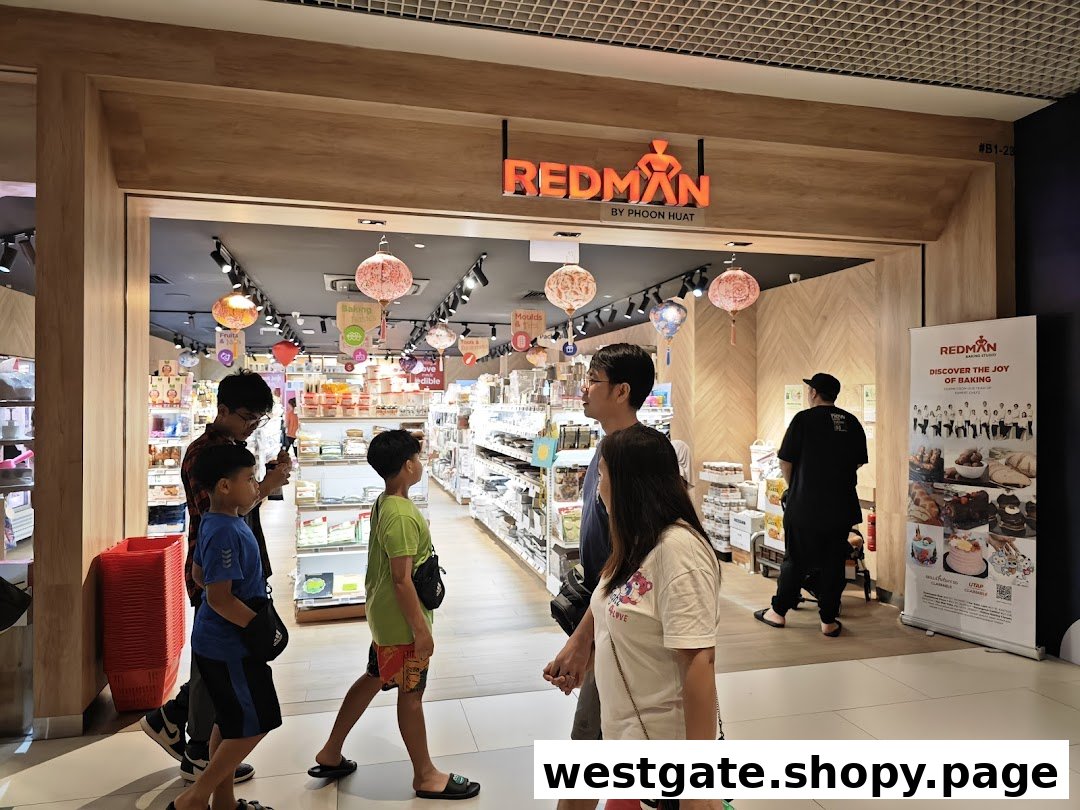 The entrance of RedMan by Phoon Huat, a baking supply store, with customers entering.