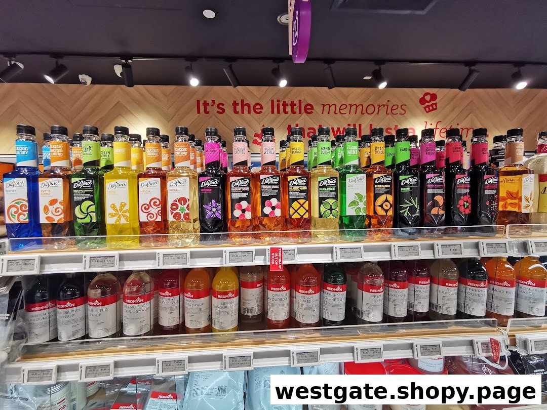 Shelves at RedMan by Phoon Huat displaying a wide array of DaVinci Gourmet and RedMan brand syrups and baking ingredients.