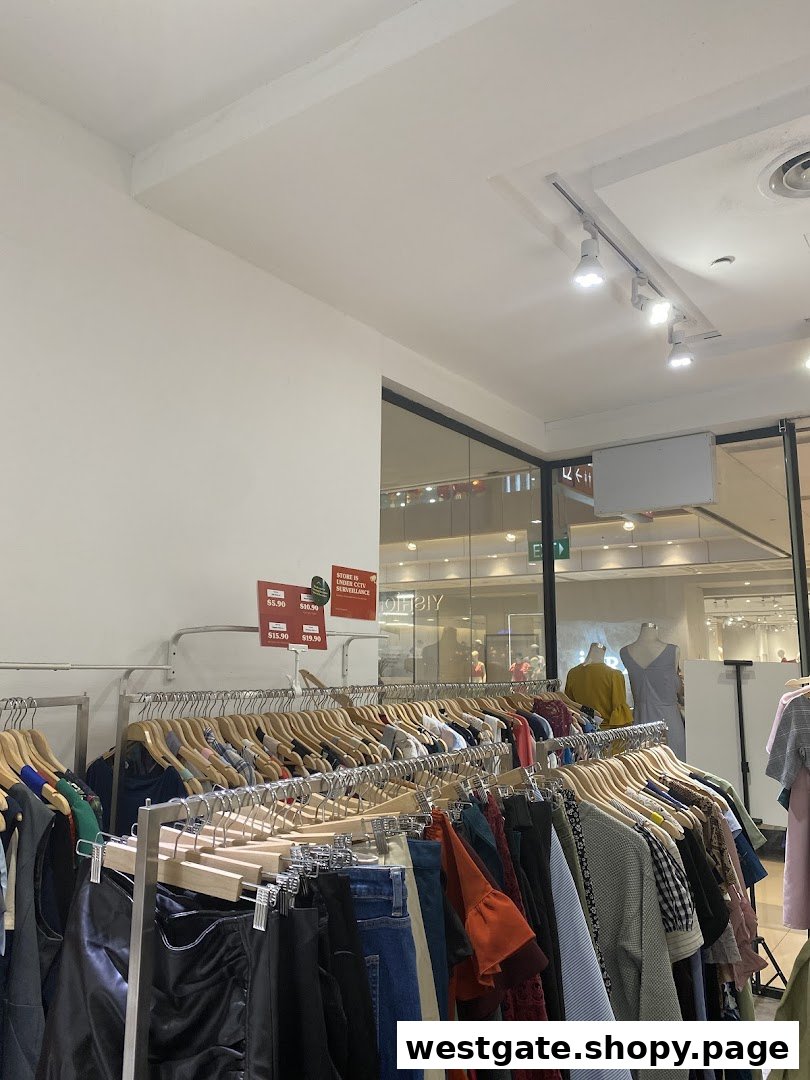 Interior view of REFASH Westgate, showcasing racks filled with pre-loved clothing.