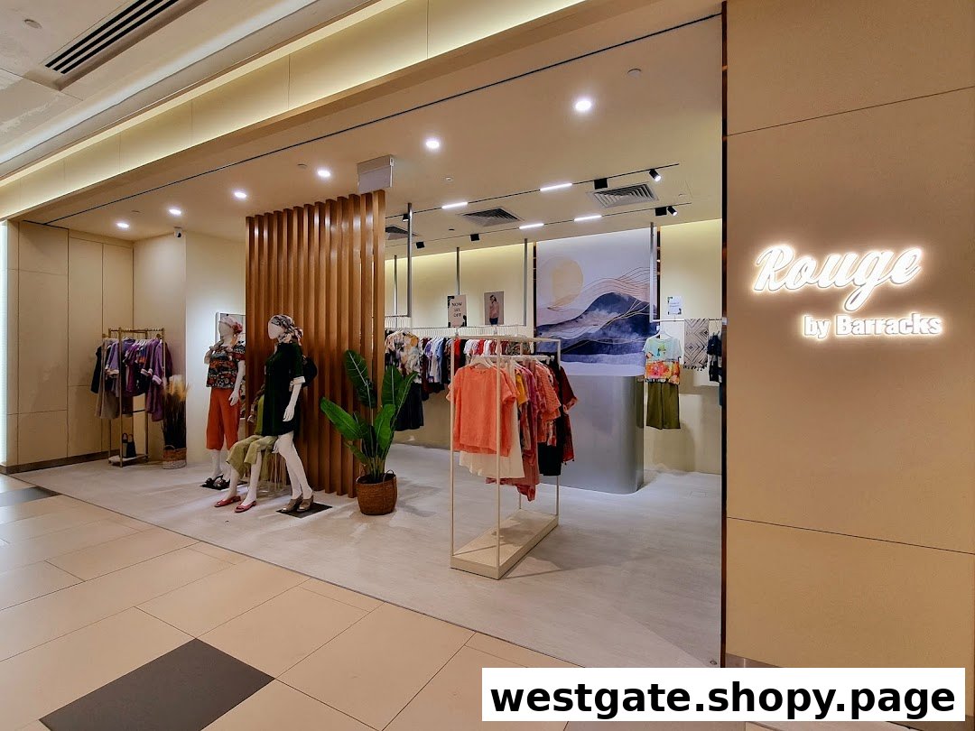 The inviting shop front of Rouge by Barracks, showcasing stylish apparel on mannequins and racks.