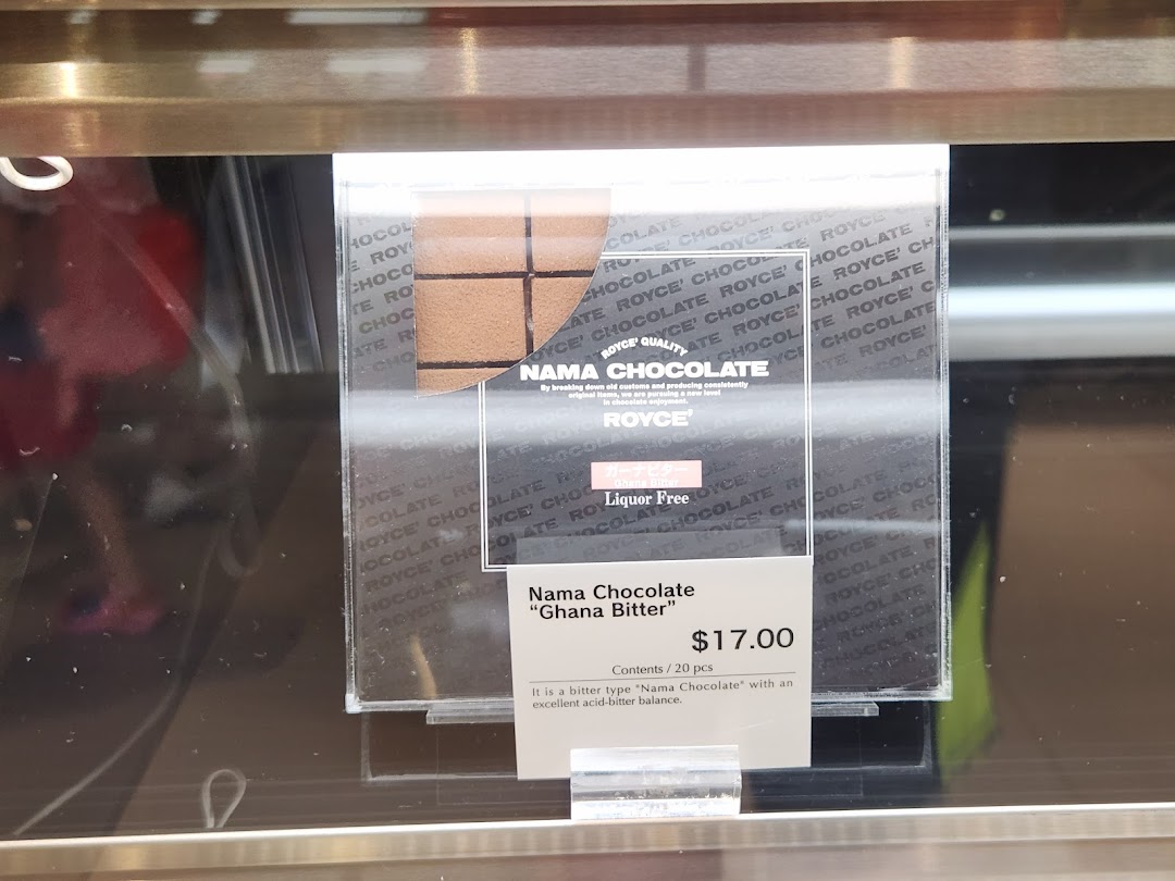 A close-up of Royce Nama Chocolate 'Ghana Bitter' displayed with its price and product details.