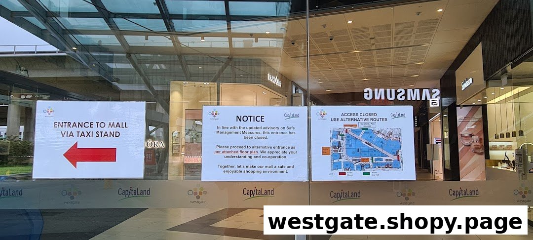 Glass mall entrance with temporary closure notices and a floor plan for alternative routes.