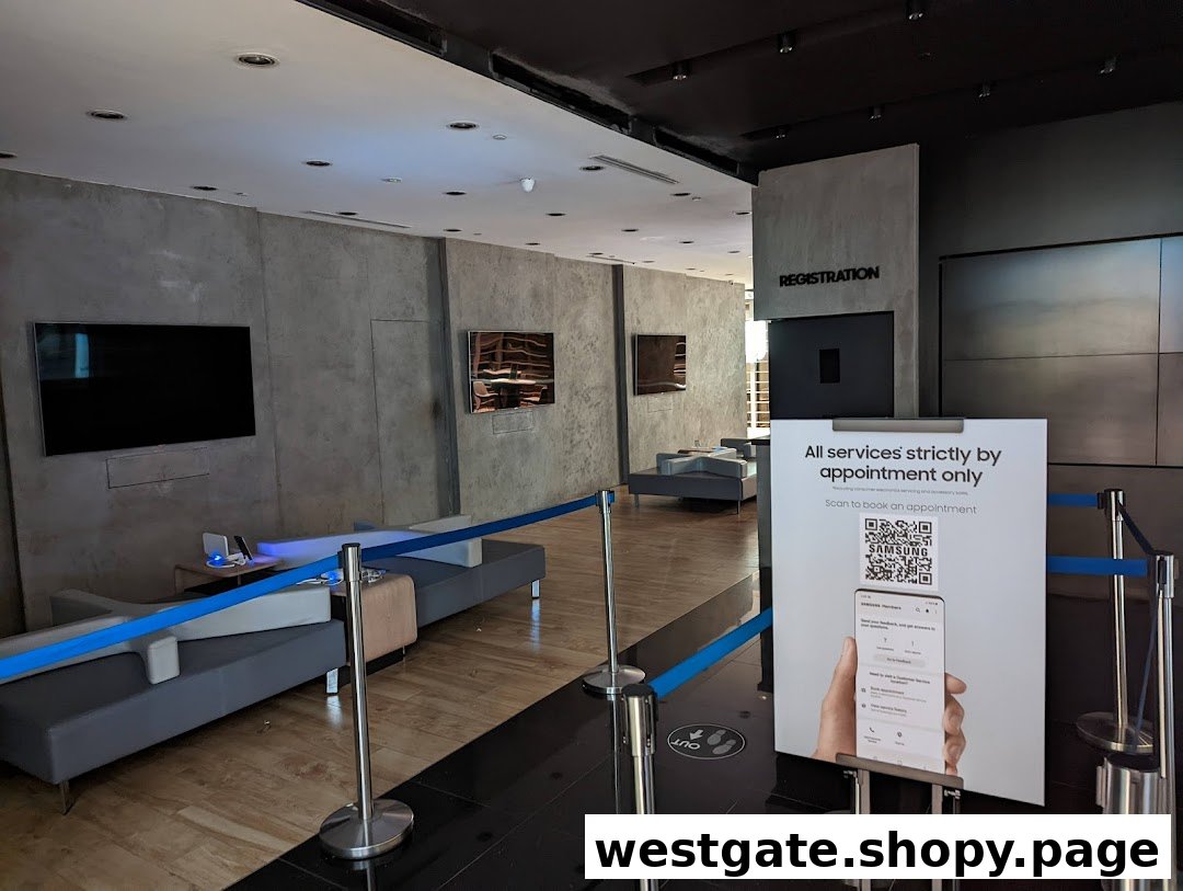 Interior of Samsung Service Centre Westgate, showing a waiting area and appointment sign.
