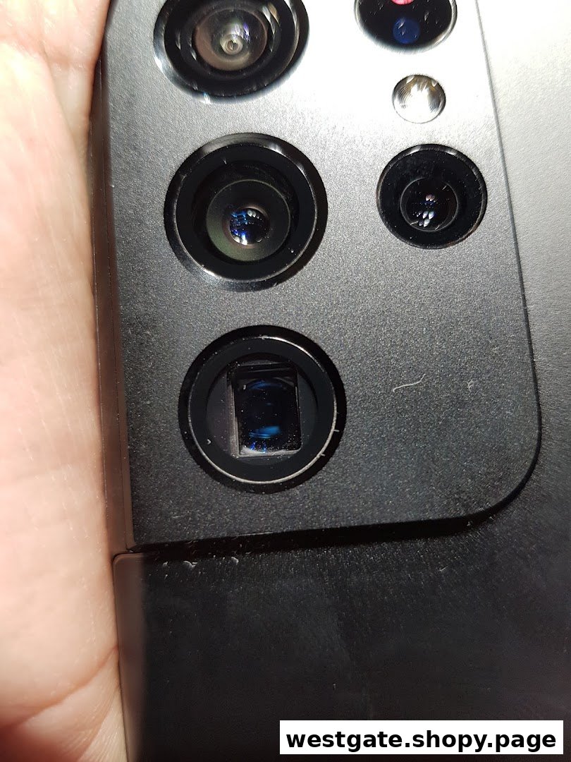 Close-up view of multiple camera lenses on the back of a modern Samsung smartphone.