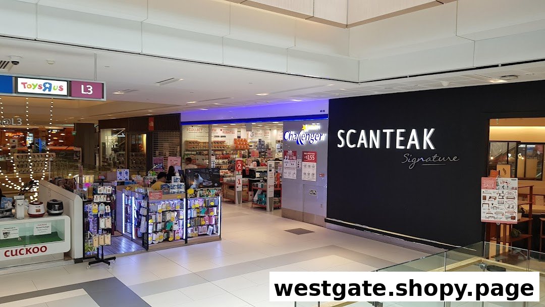 The shopfront of Scanteak Signature, a furniture store, within a bustling shopping mall.