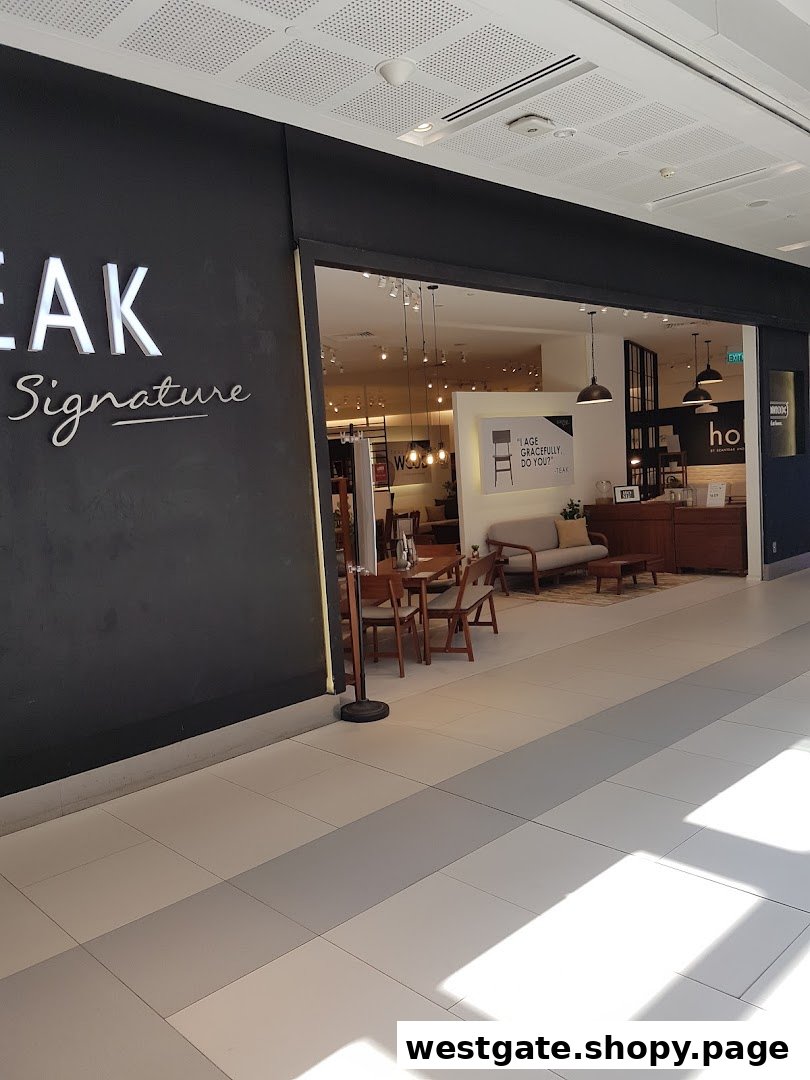 The inviting entrance of Scanteak Signature, showcasing modern teak furniture and home decor.