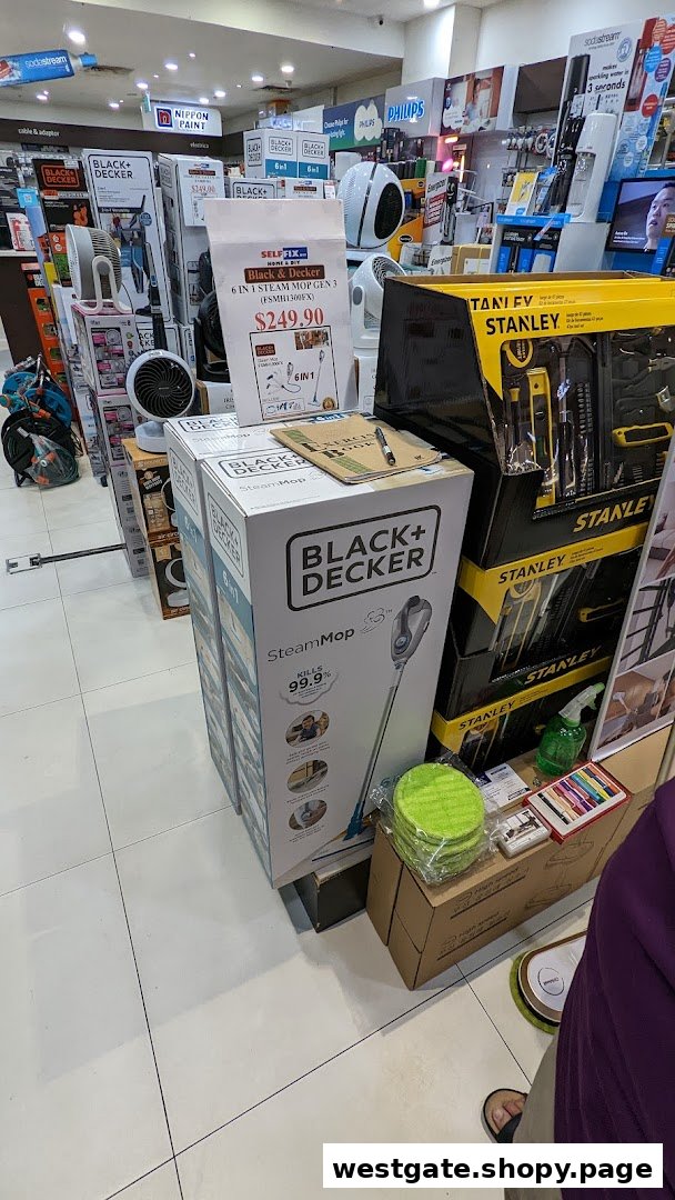 An interior view of Selffix DIY, showcasing Black+Decker steam mops, Stanley tools, and other home improvement products.