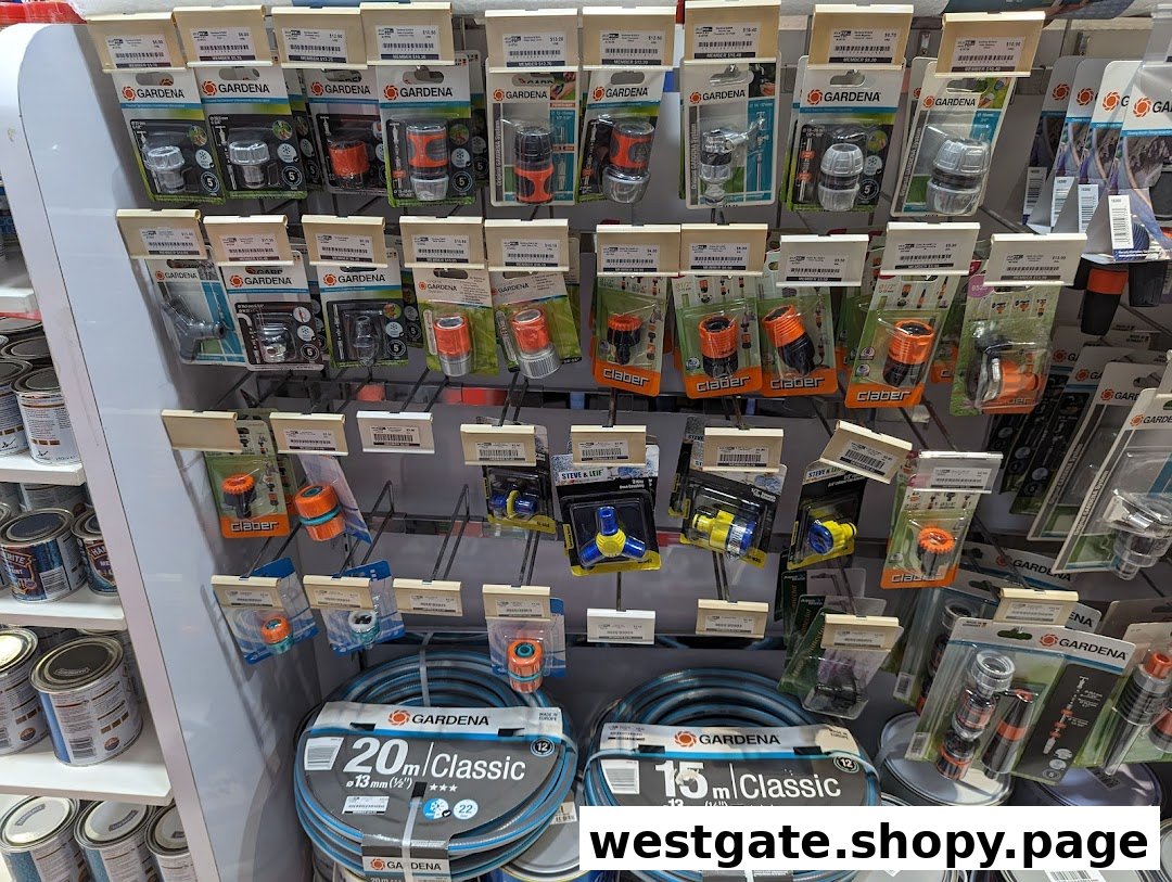 A retail display of Gardena brand gardening hoses, connectors, and accessories at Selffix DIY.