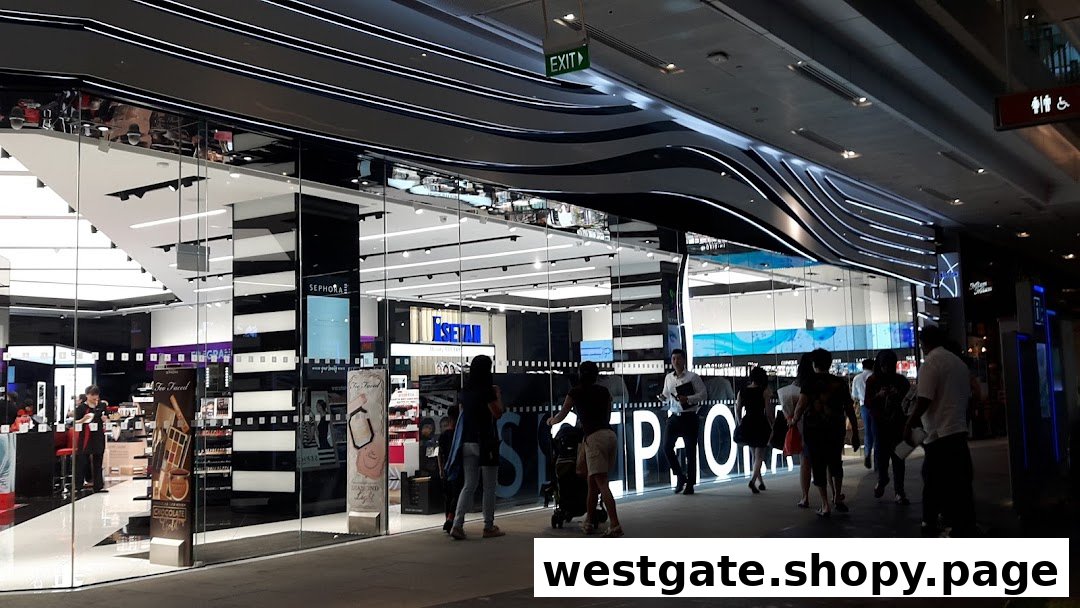 The brightly lit entrance of Sephora Westgate, showcasing its wide glass facade and customers entering.