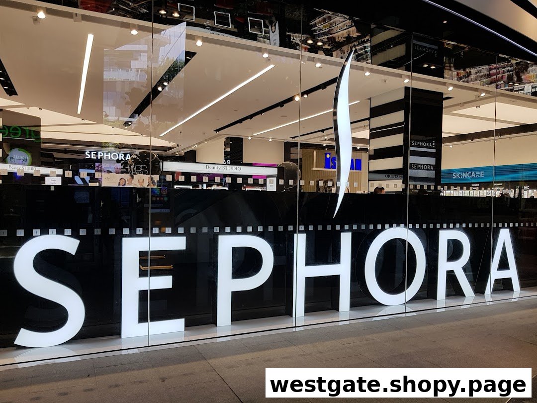 The storefront of Sephora with its large white logo visible through glass.
