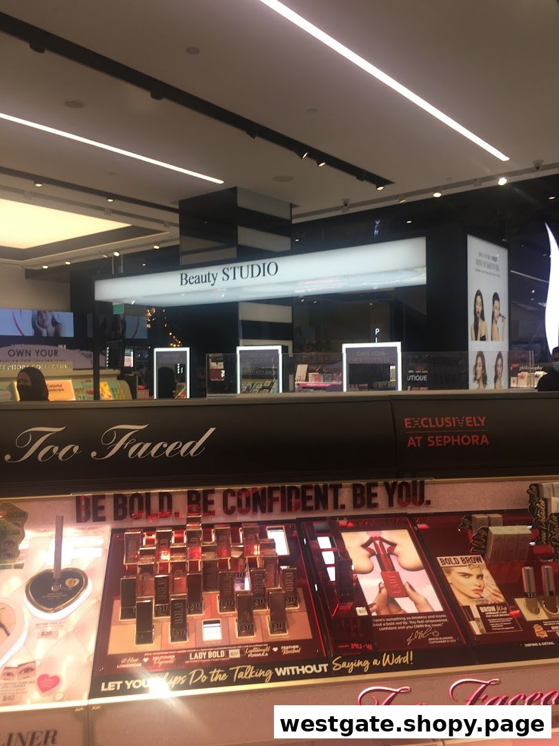 An interior view of Sephora's Beauty Studio featuring a vibrant Too Faced makeup display.