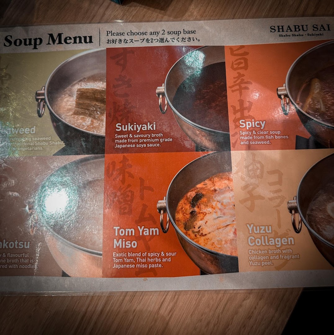 A detailed soup menu from Shabu Sai, showcasing various broth options for shabu-shabu.