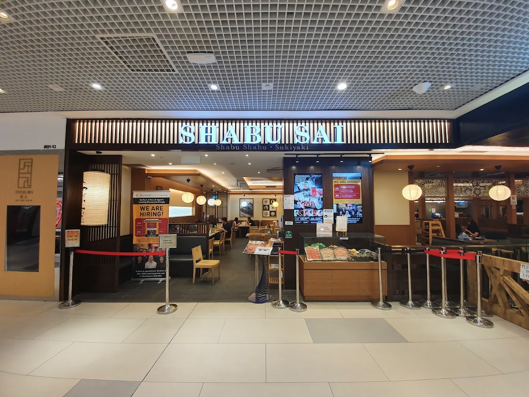 The inviting entrance of Shabu Sai, a Japanese shabu-shabu and sukiyaki restaurant, with visible interior.