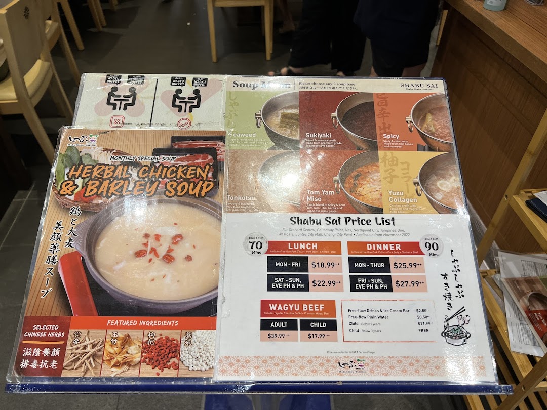 A detailed menu and price list for Shabu Sai, featuring various soup bases, a monthly special, and buffet pricing.
