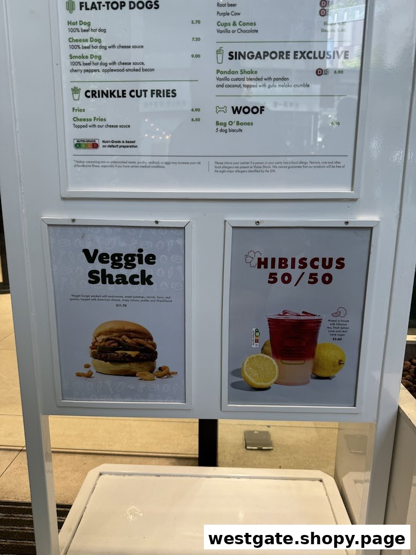 A detailed menu board displaying various food and drink items, including hot dogs, fries, shakes, and a veggie burger.
