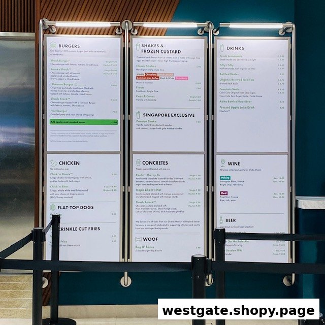 A comprehensive menu board displaying food and drink options at Shake Shack Westgate.