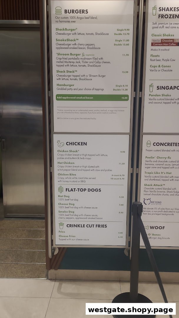 A detailed menu board displaying food and drink options at Shake Shack.