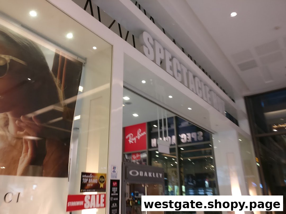 The entrance of Spectacle Hut Westgate, featuring a large display, prominent branding, and a 'SALE' sign.