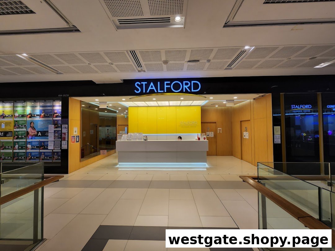 The bright, welcoming entrance of Stalford Learning Centre with a reception desk and information displays.
