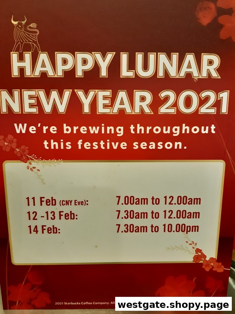 A Starbucks sign wishing Happy Lunar New Year 2021 and listing special festive operating hours.
