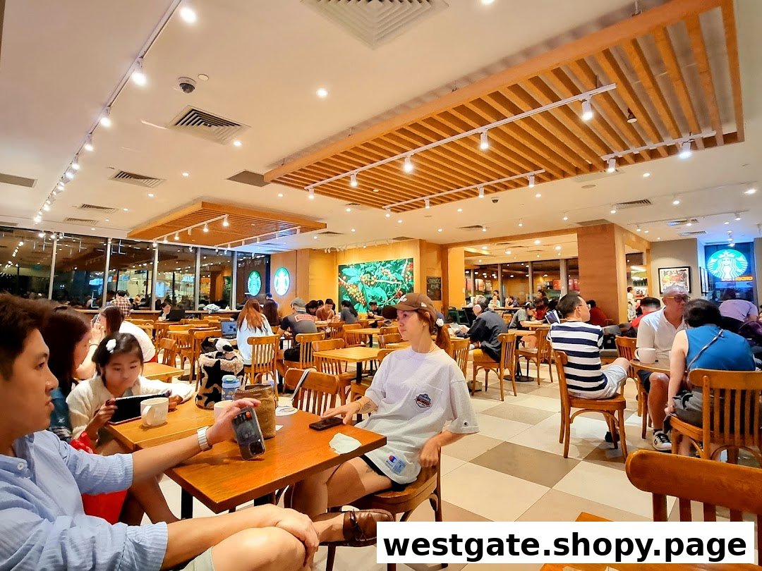 A bustling interior view of Starbucks Westgate with customers enjoying coffee and conversation.