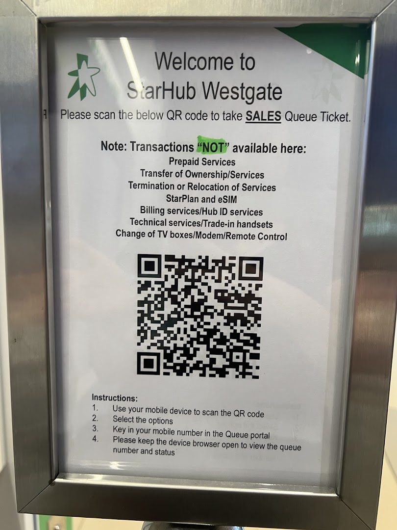 A StarHub Westgate sign displaying a QR code for sales queue tickets and a list of unavailable transactions.