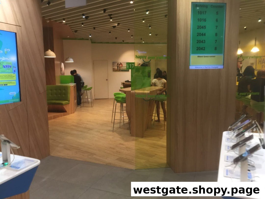 Interior view of StarHub Westgate, featuring a queue counter, seating, and product displays.
