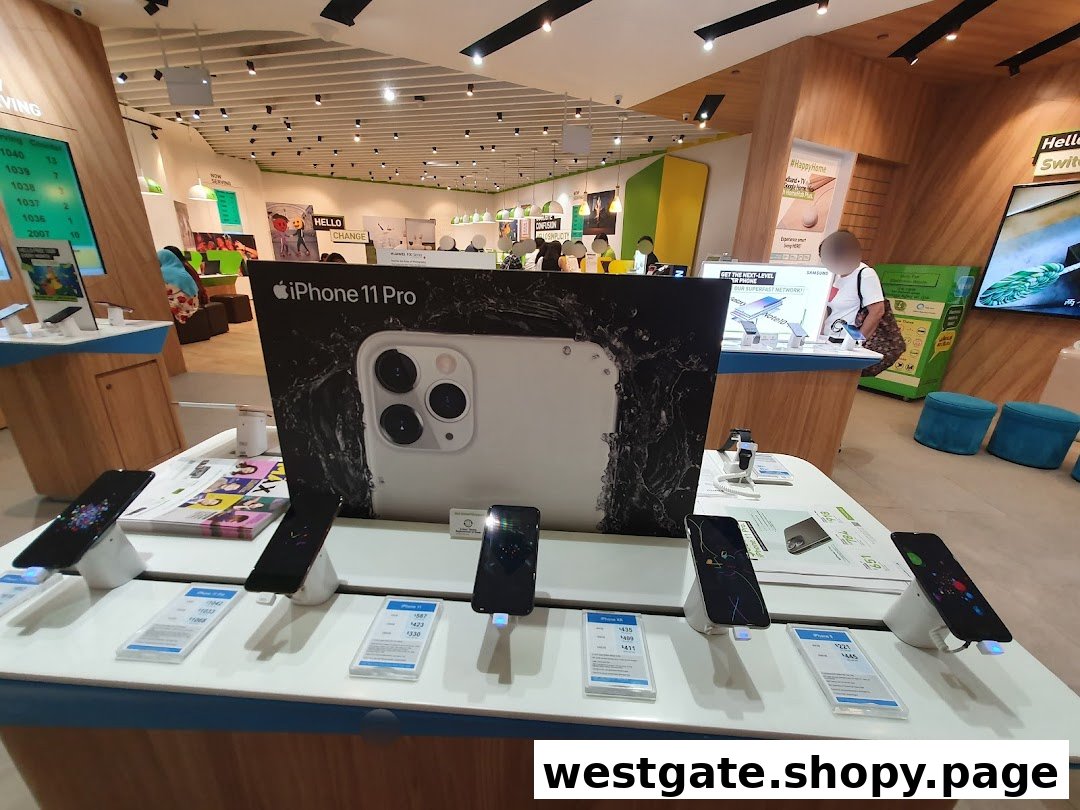 Interior view of StarHub Westgate, showcasing mobile phones like iPhone 11 Pro on display for customers.