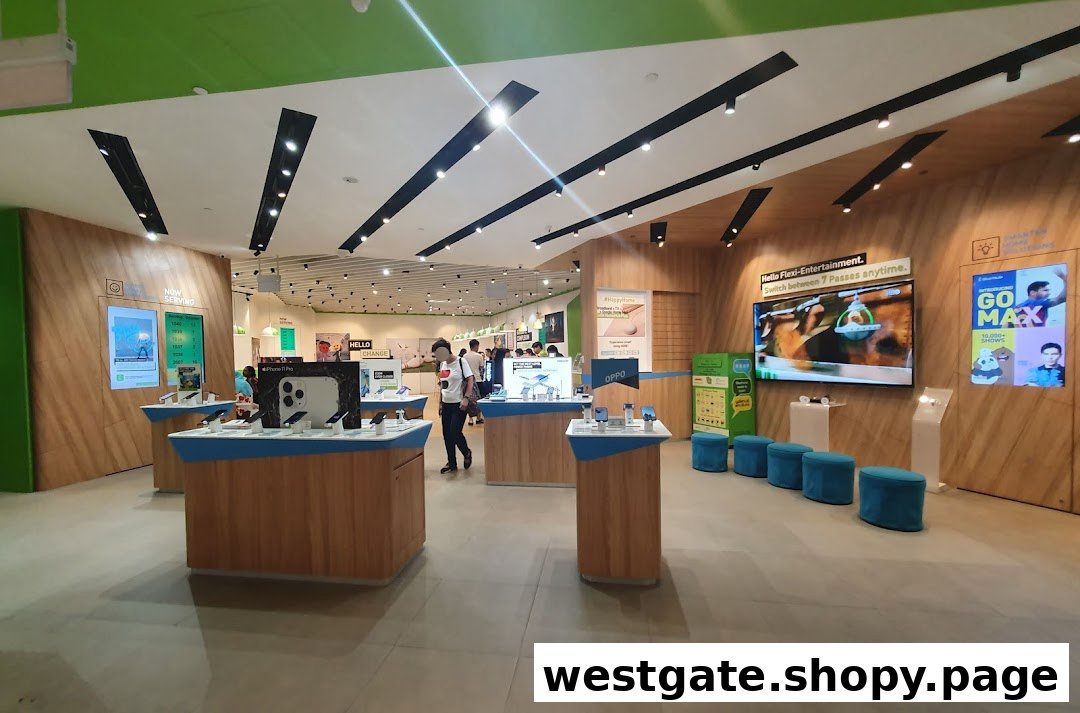 Interior view of StarHub Westgate, showcasing mobile phones on display tables and large promotional screens.
