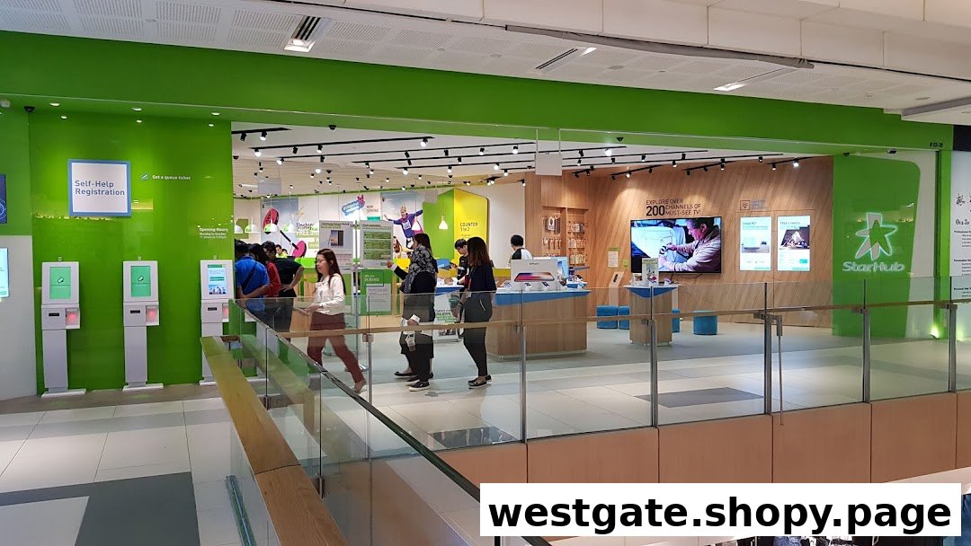 Interior view of StarHub Westgate, showing self-help kiosks, customer service counters, and product displays.