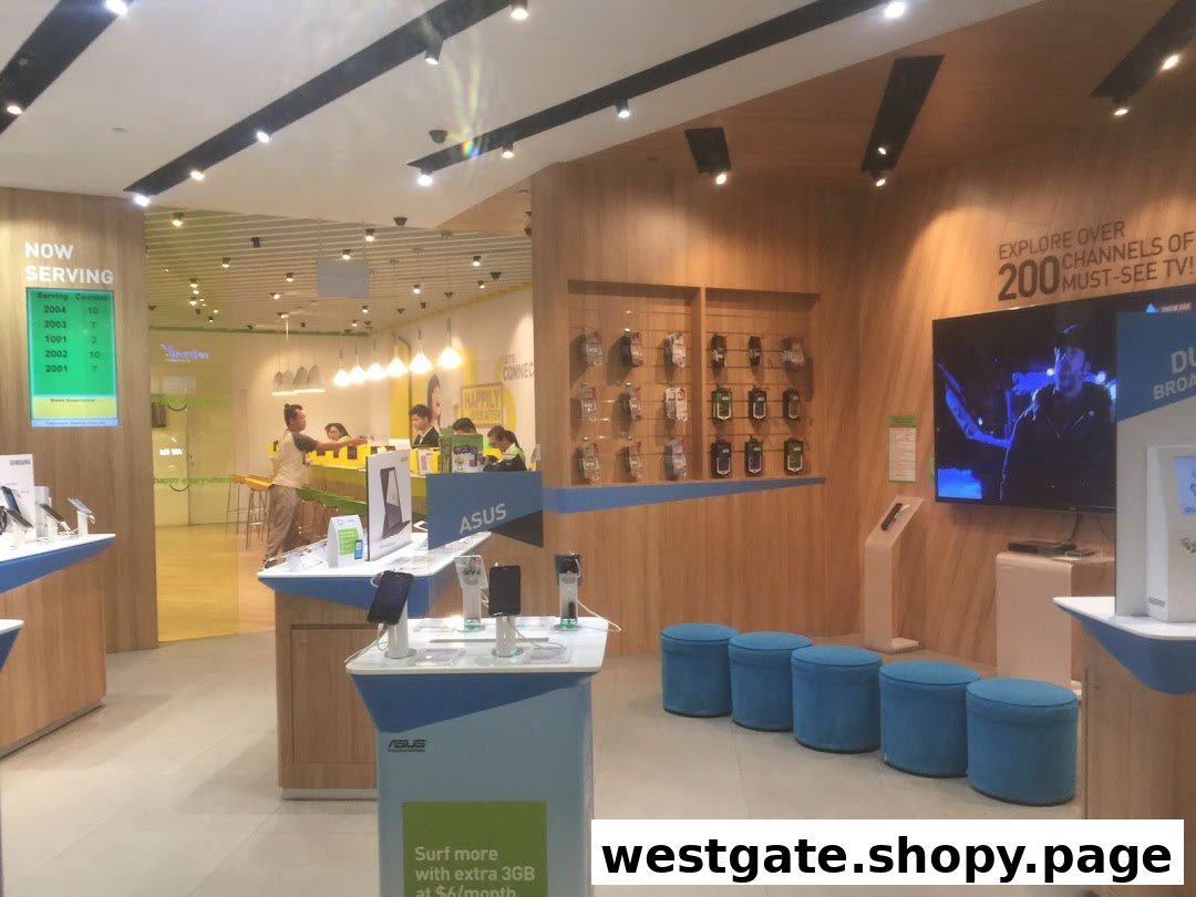 An interior view of StarHub Westgate, showcasing display counters, a service area, and a large screen.