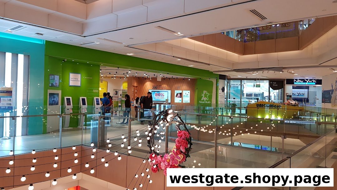 View of StarHub Westgate, a telecommunications shop, from an upper level of a bustling shopping mall.