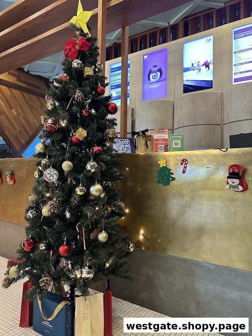 A festive Christmas tree decorates the interior of Strip Co-Ed Westgate, featuring promotional displays in the background.