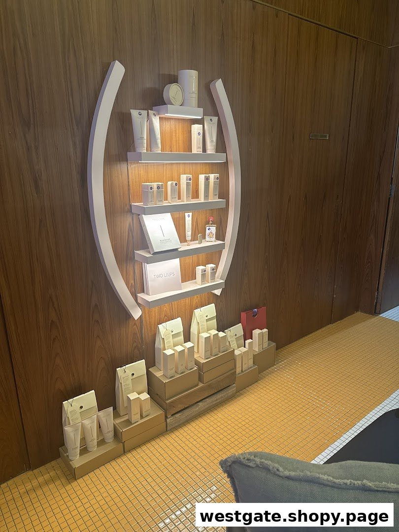 An elegant display of skincare and beauty products on shelves and floor in a retail setting.