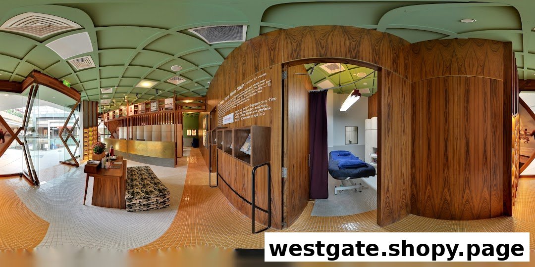 Interior view of Strip Co-Ed Westgate, showcasing its modern reception, waiting area, and a treatment room.