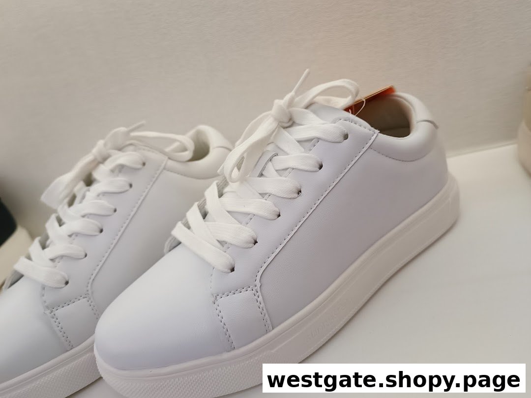 Close-up of a pair of pristine white sneakers displayed at Sunnystep.