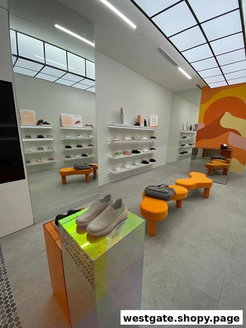 Bright, modern shoe store interior with shoes displayed on shelves and a colorful mural.