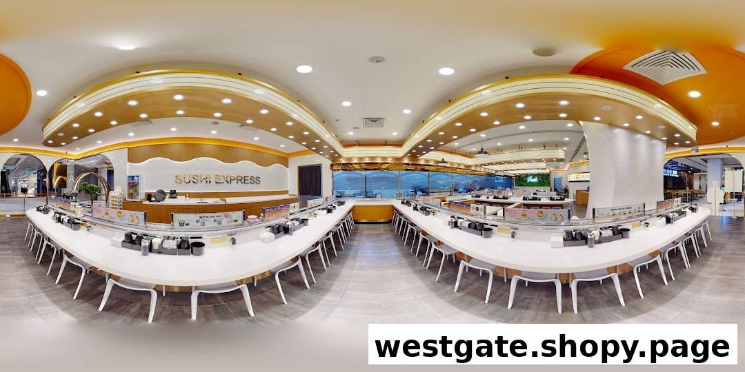 A panoramic view of the modern and spacious interior of Sushi Express, featuring its signature conveyor belt dining.
