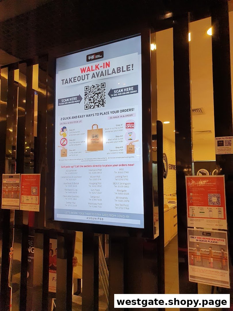 A digital display at Sushi Express detailing walk-in and takeout order procedures with outlet contact information.