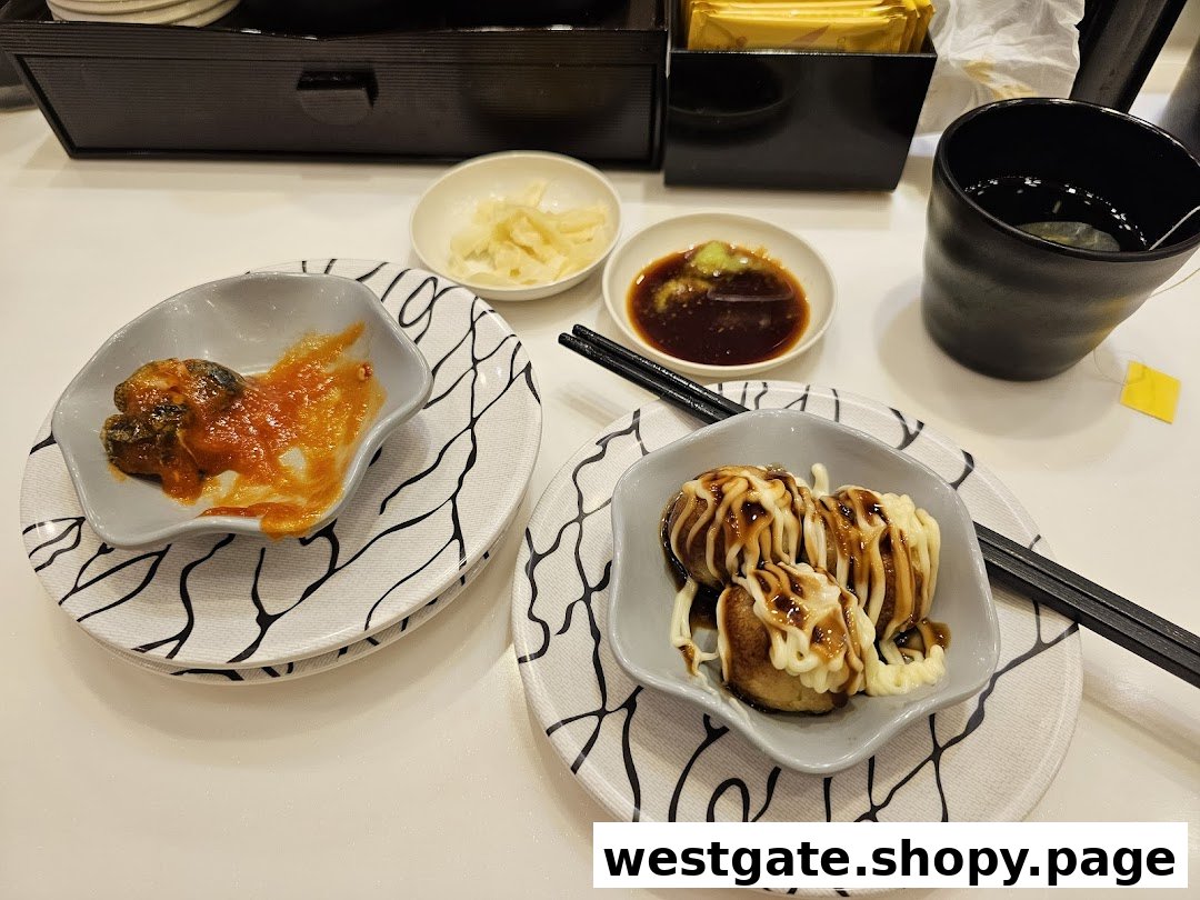 Close-up of delicious Japanese side dishes and tea served at Sushi Express.
