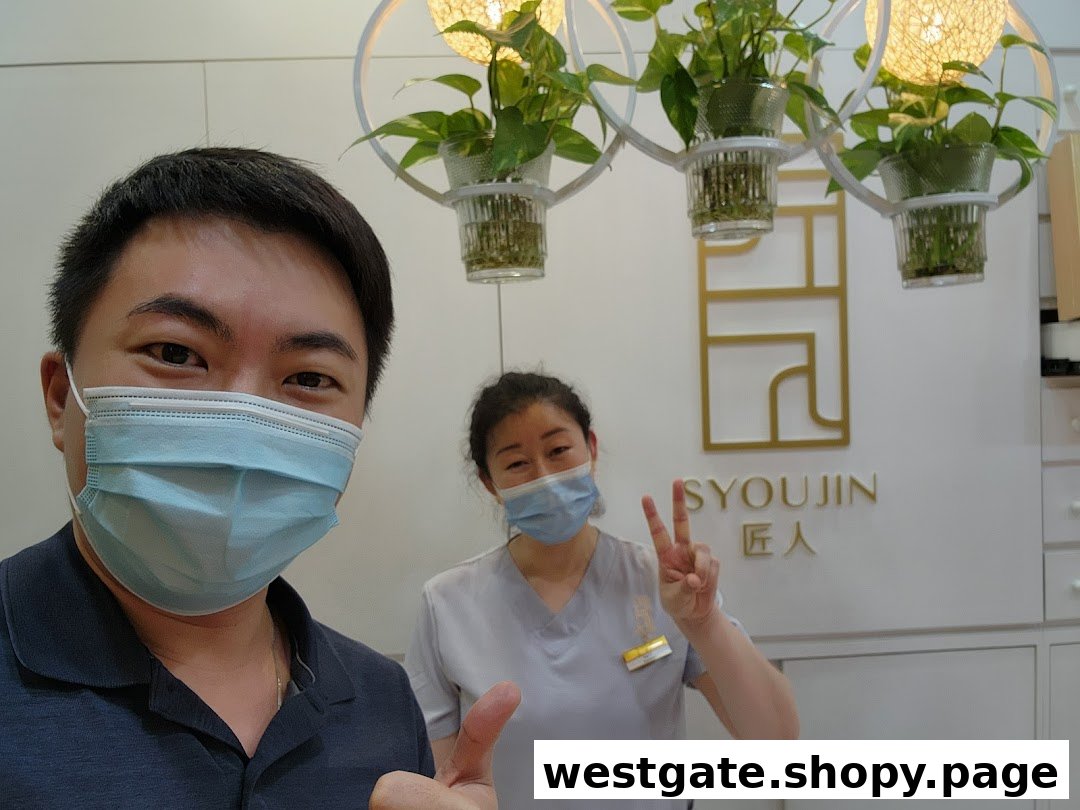 Two masked individuals pose inside Syoujin, featuring its logo and decorative hanging plants.
