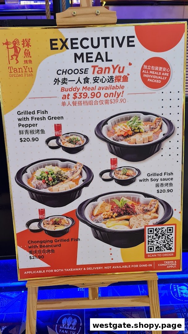 A menu board for TANYU Grilled Fish, showcasing executive and buddy meal options for takeaway and delivery.