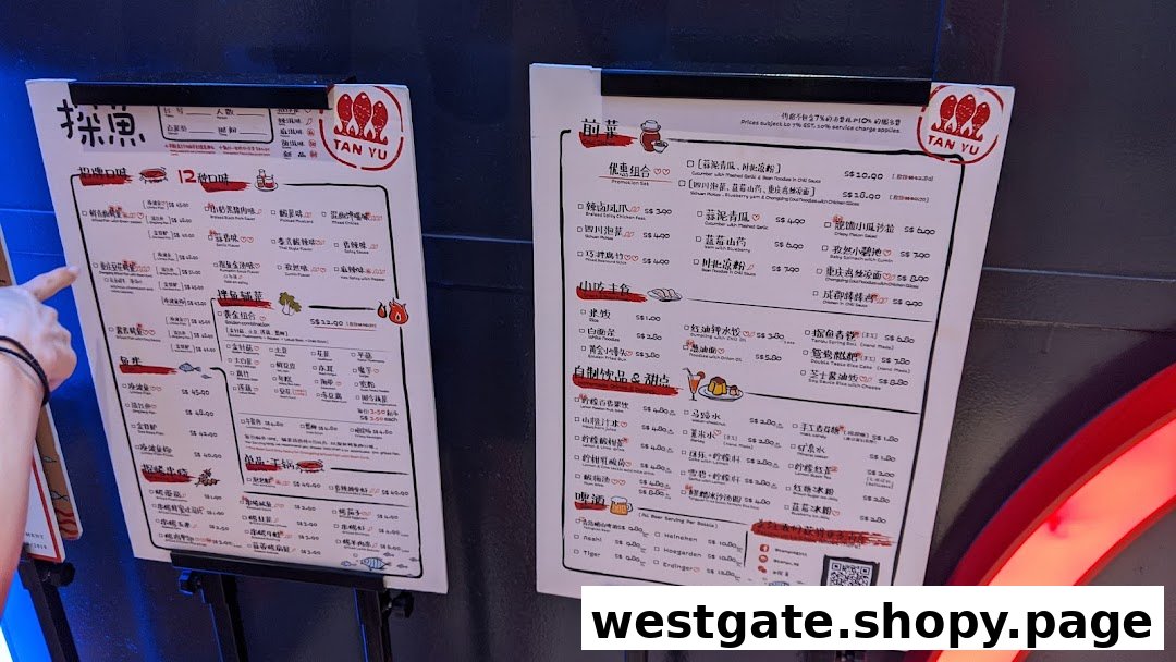 Two large menu boards displaying a variety of Chinese dishes and drinks.