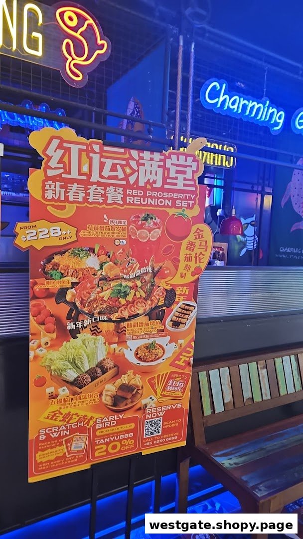 A vibrant promotional standee for TANYU's 'Red Prosperity Reunion Set' featuring festive dishes and offers.