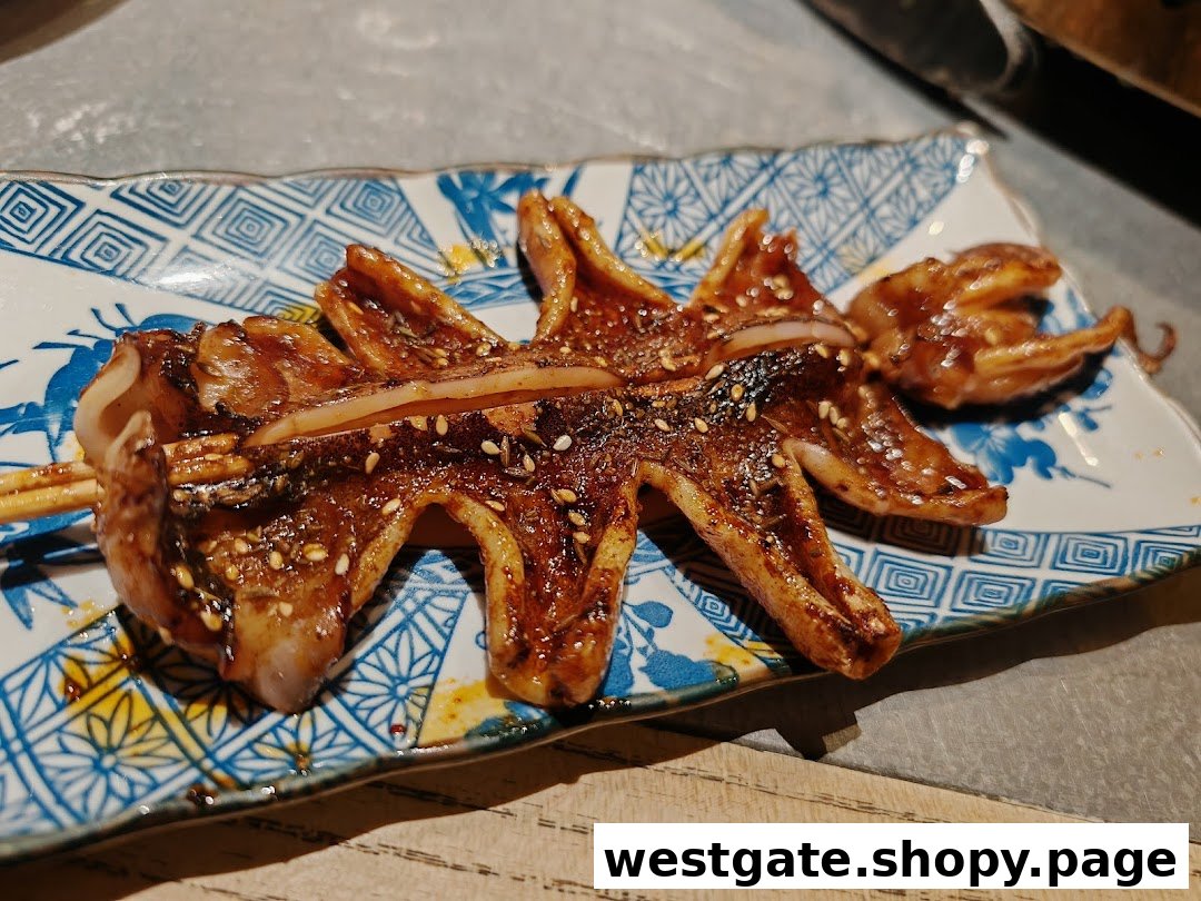 A close-up of a grilled, seasoned squid or octopus served on a decorative blue and white plate.