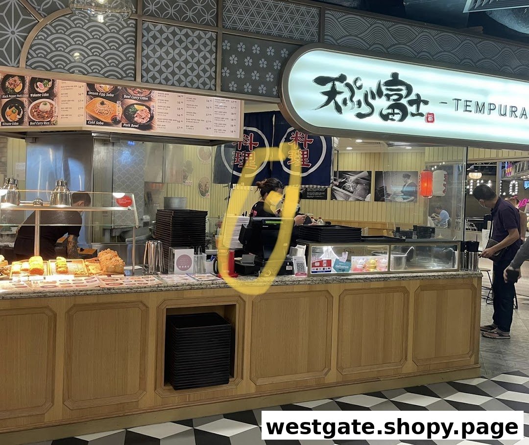An inviting view of Tempura Fuji's counter, showcasing their menu board and a bustling service area.