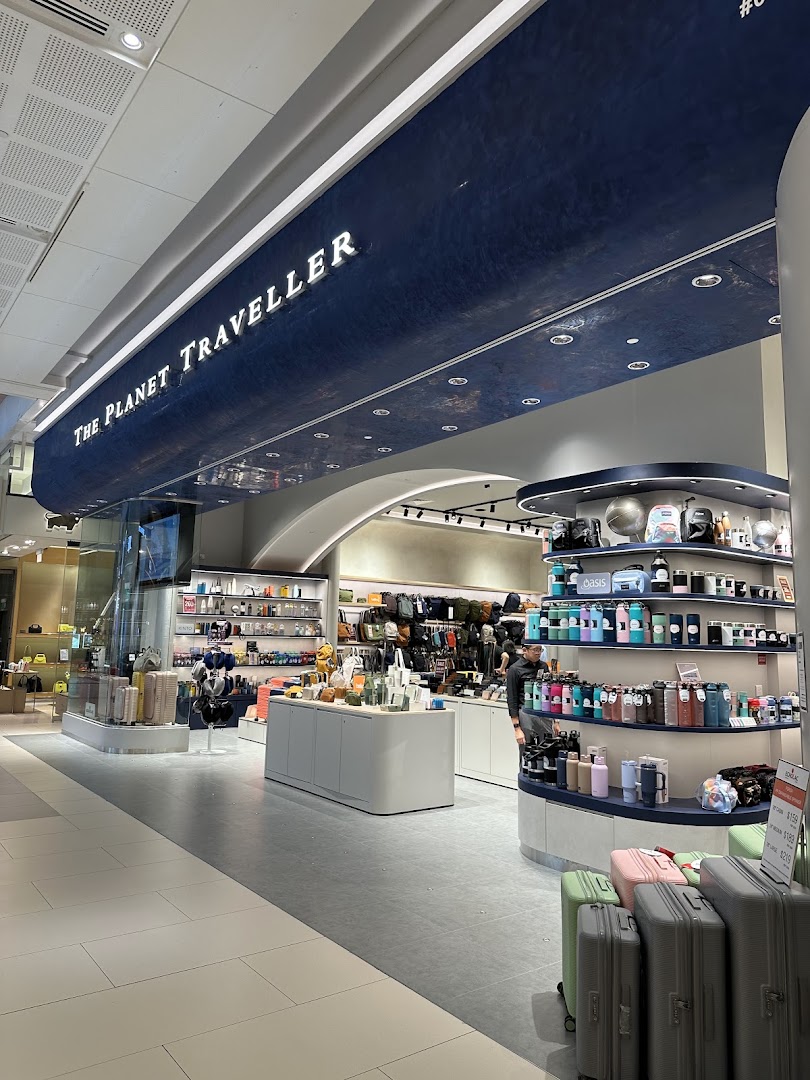 The Planet Traveller shop entrance showcasing a wide array of travel essentials, luggage, and accessories.